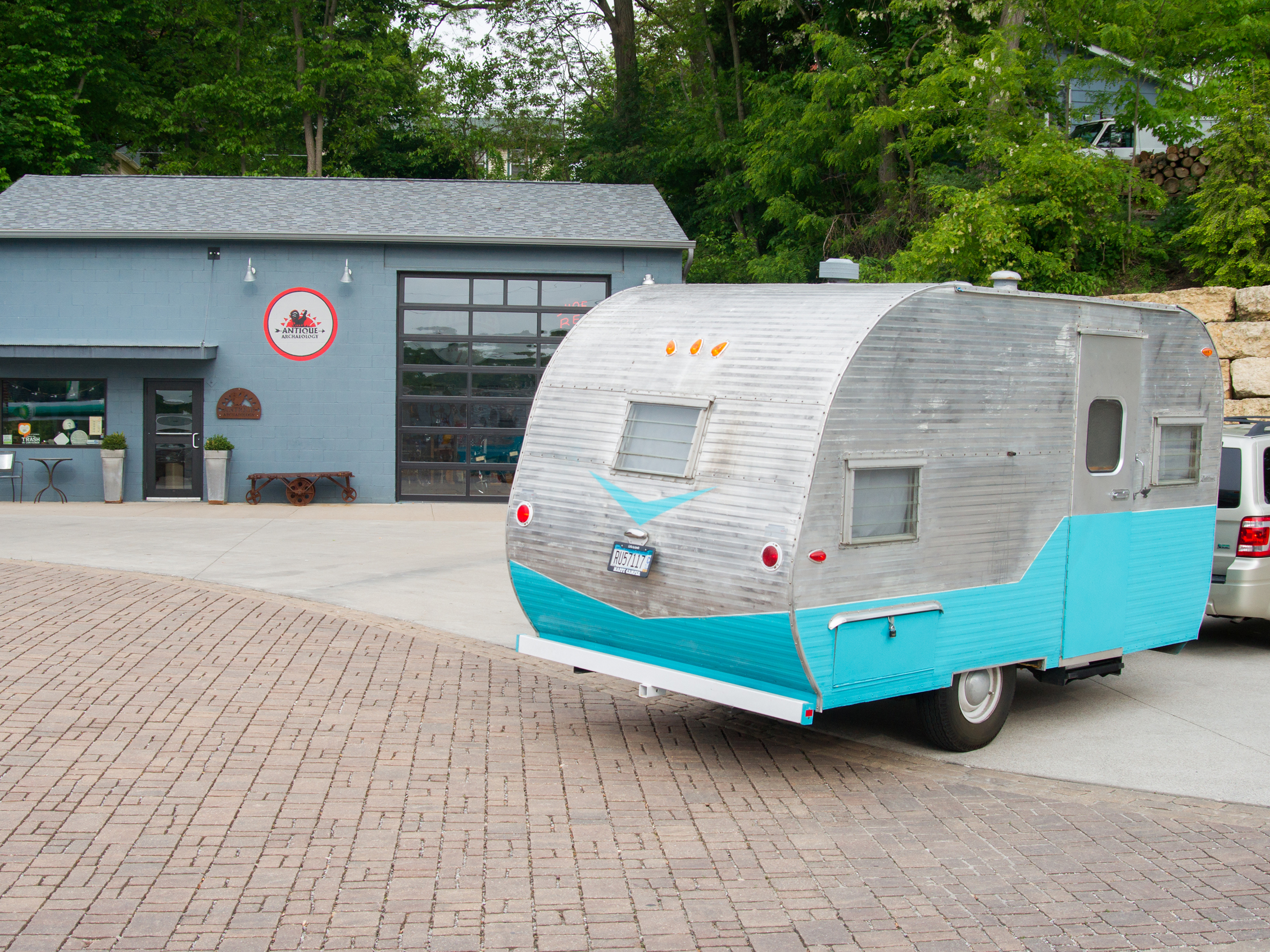 Penelope: A Vintage Pathfinder with Open Doors in Minnesota